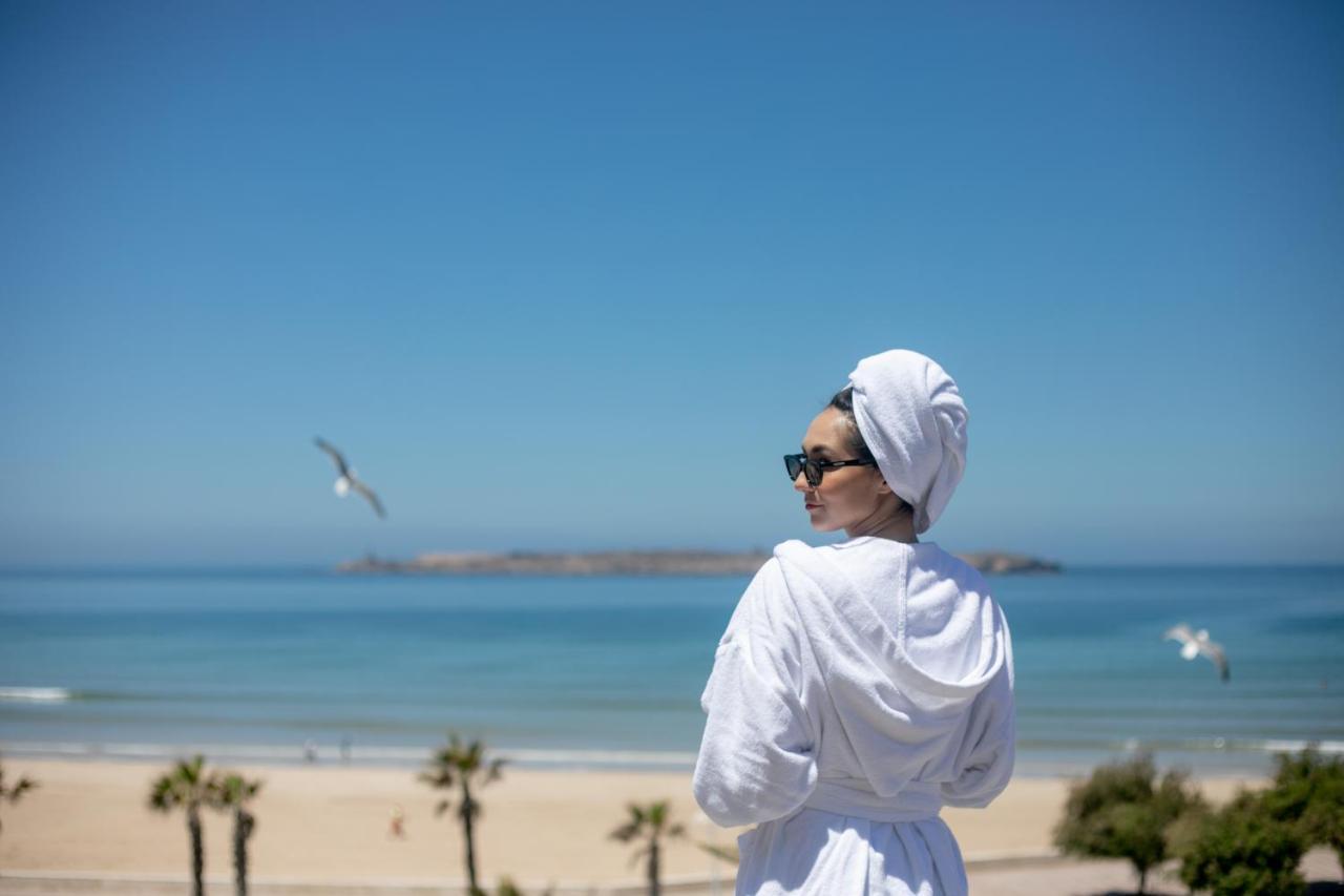 Atlas Essaouira Riad Resort Exterior photo A woman wearing a bathrobe